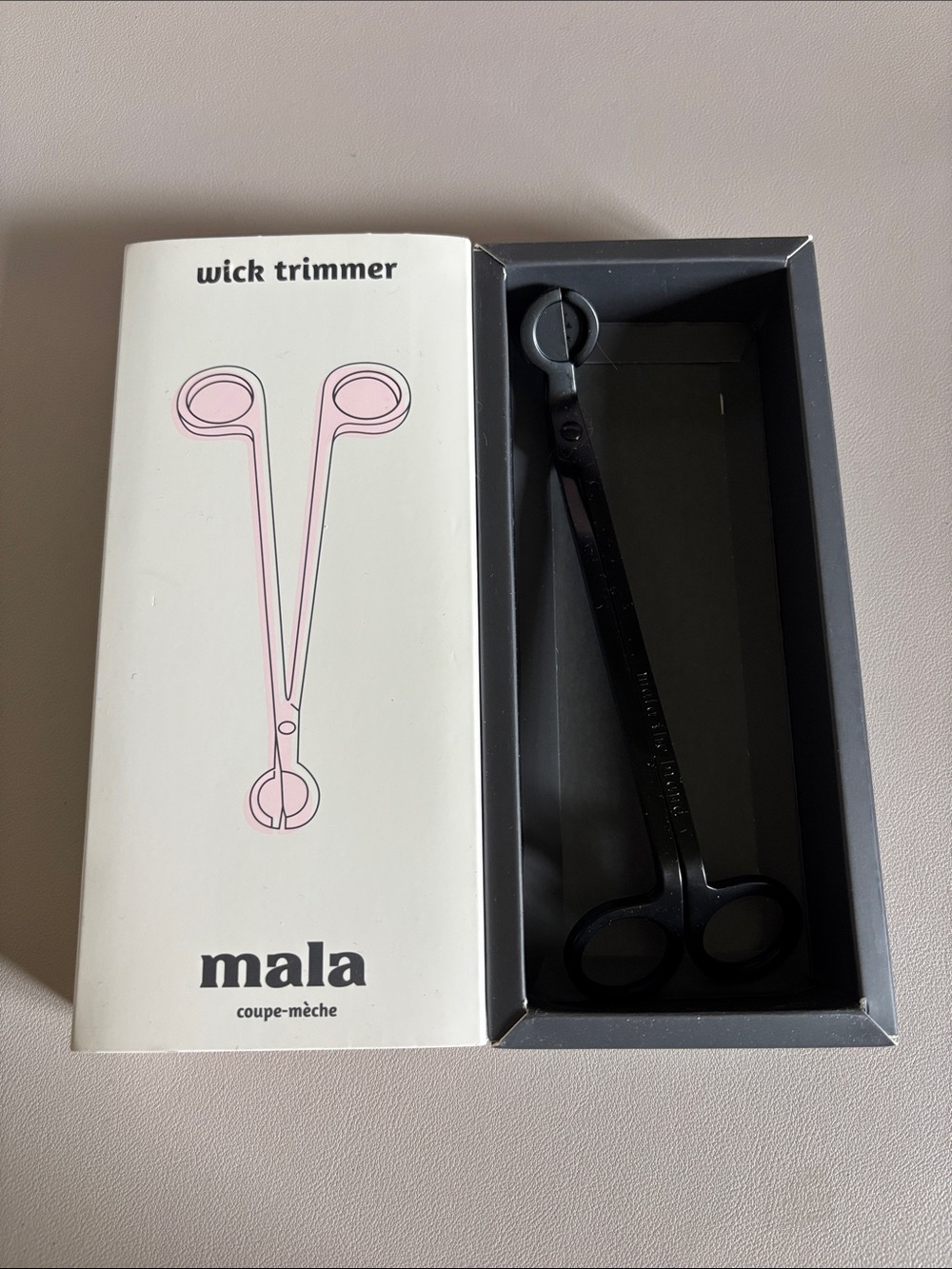mala Wick Trimmer in Black